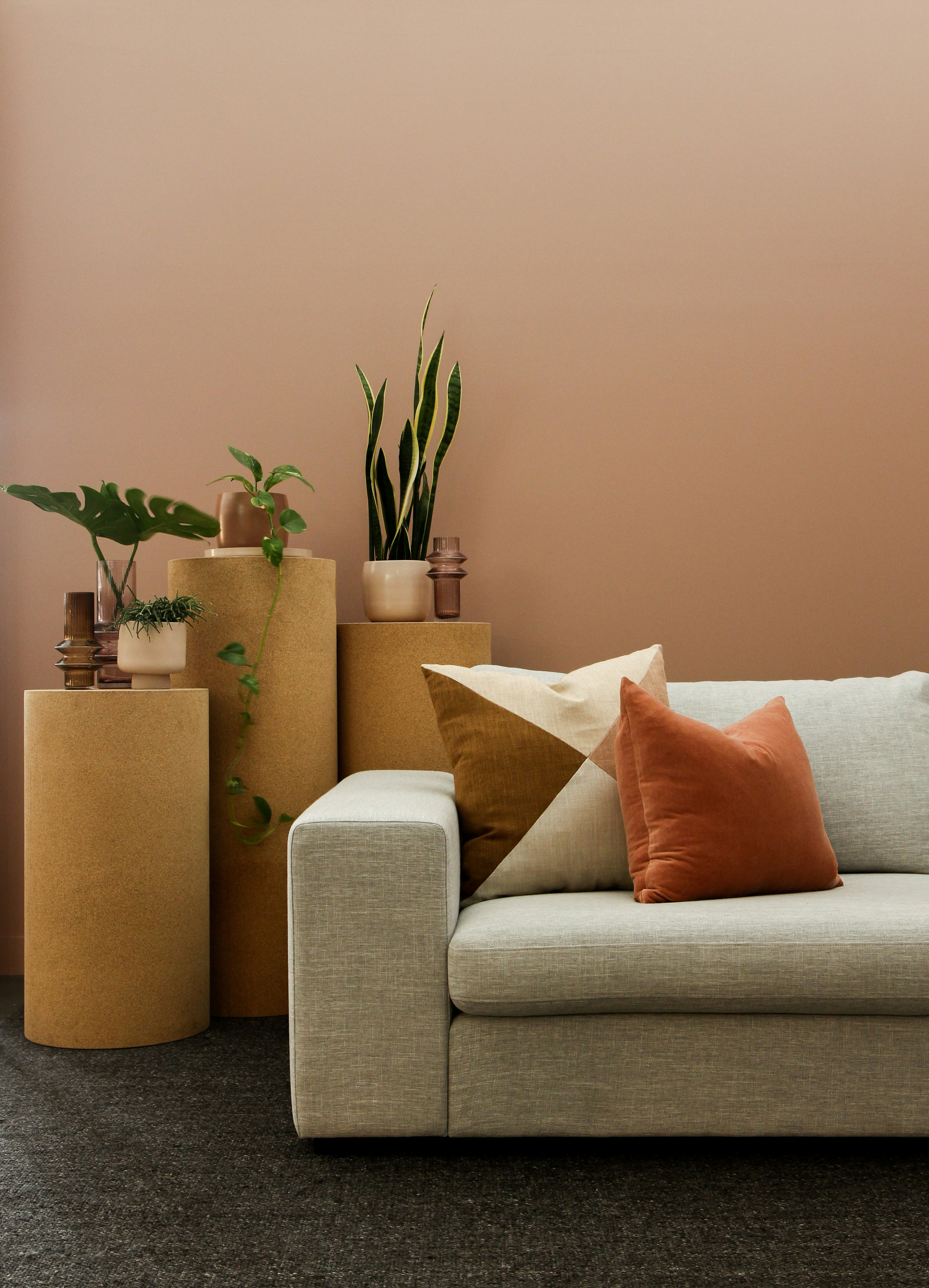 brown throw pillow on white couch